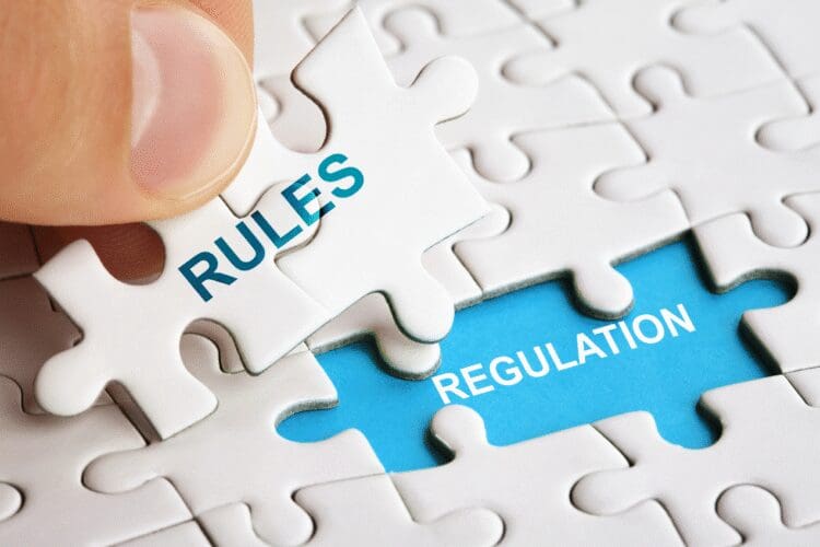 Puzzle pieces illustrating the connection between regulatory rules and compliance regulations.