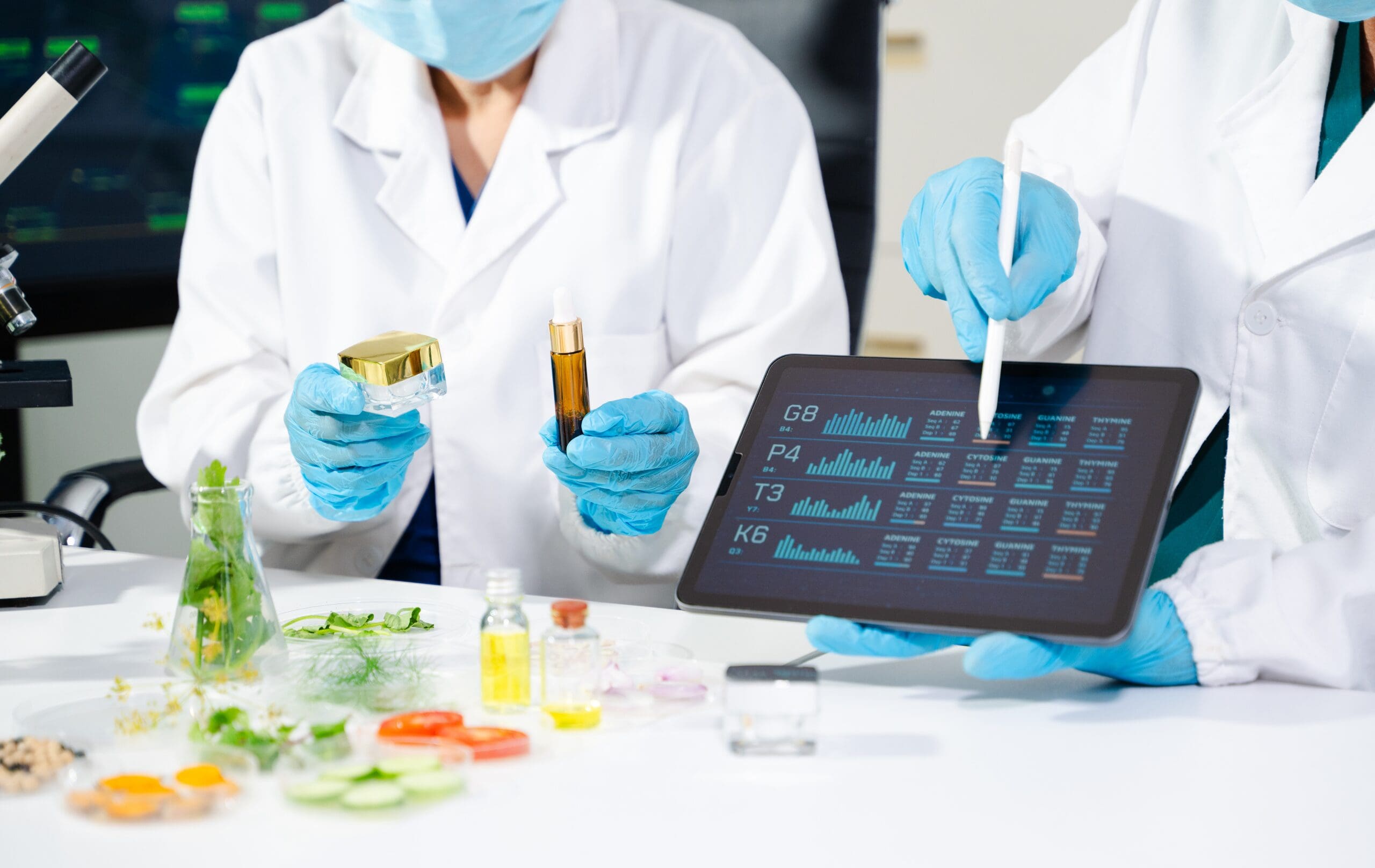 Scientists evaluating cosmetic formulations and skincare products in a laboratory.